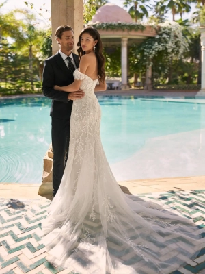 Robe de mariée sirène en dentelle et perles avec décolleté plongeant